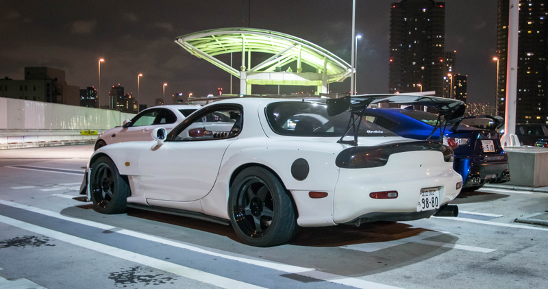 Illustration for article titled This Parking Lot In Tokyo Will Bring All Your Car Fantasies To Life